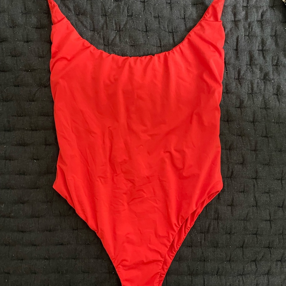 High leg one piece